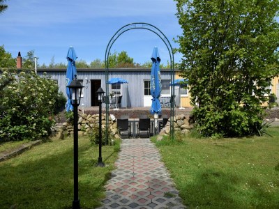 Apartment Charmante Ferienwohnung mit Garten in Wiek - Outdoor photo 3