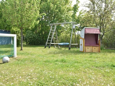 Apartment Charmante Ferienwohnung mit Garten in Wiek - Outdoor photo 9