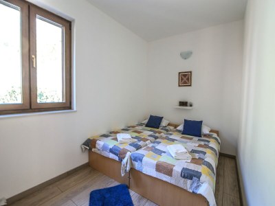 Apartment Apartment in Pridvorje near Pasjaca Beach - Features photo 9
