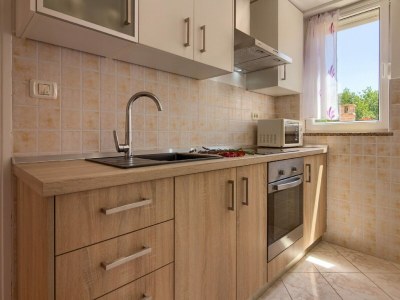 Holiday house Villa in Peroj mit Pool am Strand - Features photo 27