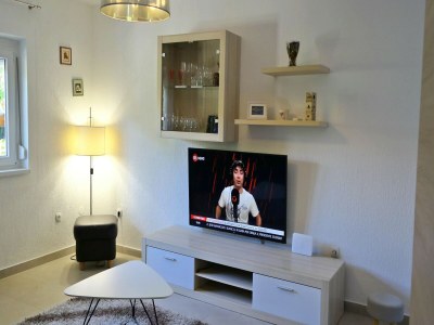 Holiday house Holiday home in center of Šilo near beach - Features photo 29