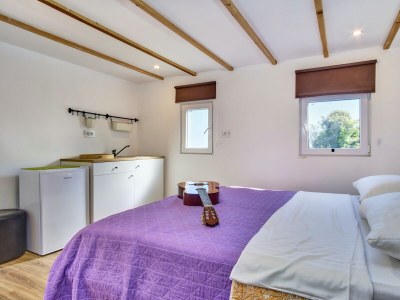 Holiday house LA MER on the beach with sea view and large garden - Features photo 32