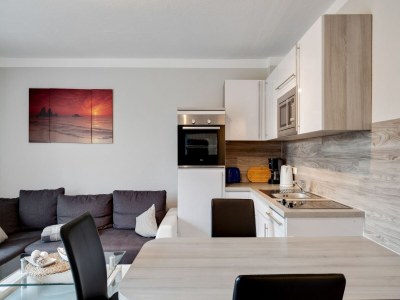 Apartment Gemütlicher Küstenurlaub mit Garten - Features photo 19