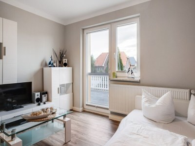 Apartment Gemütlicher Küstenurlaub mit Garten - Features photo 28
