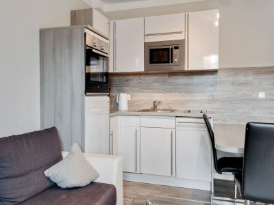 Apartment Gemütlicher Küstenurlaub mit Garten - Features photo 30