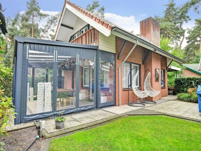Holiday house Ferienhaus mit einer überdachten Terrasse - Holiday house