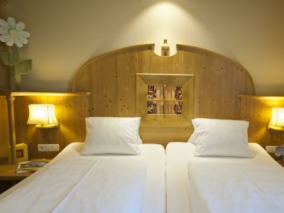 Holiday room Wohn- Schlafzimmer mit Balkon / Halbpension - Features photo 100