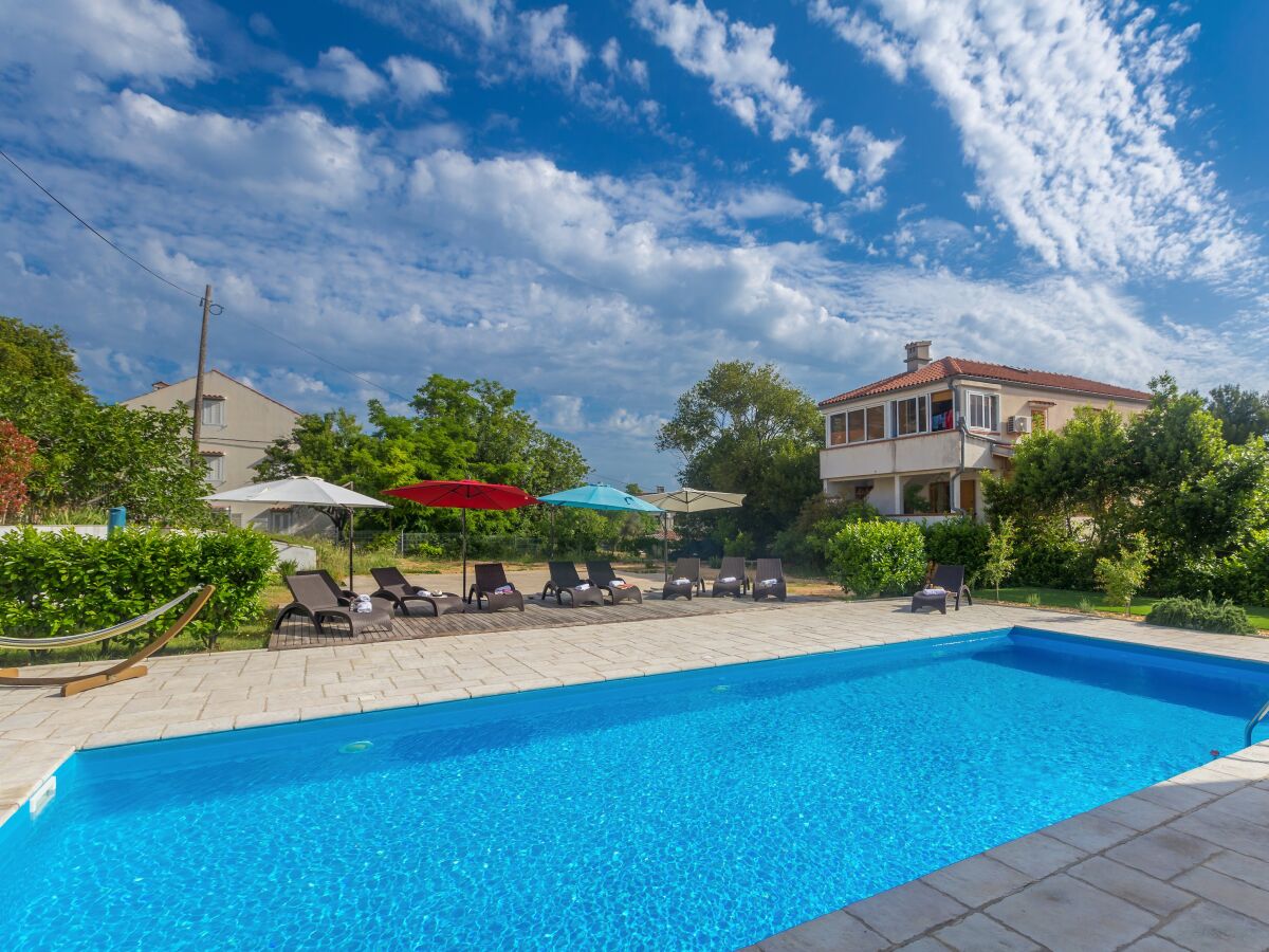 Holiday apartment Michele with large heated pool 50m2 and sea view