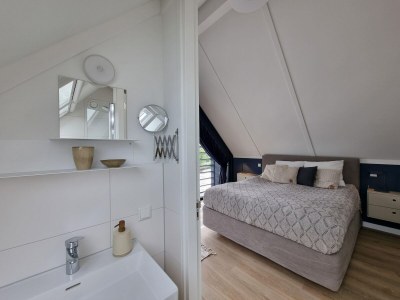 Holiday house Wasservilla in Balk mit eigenem Steg - Features photo 11