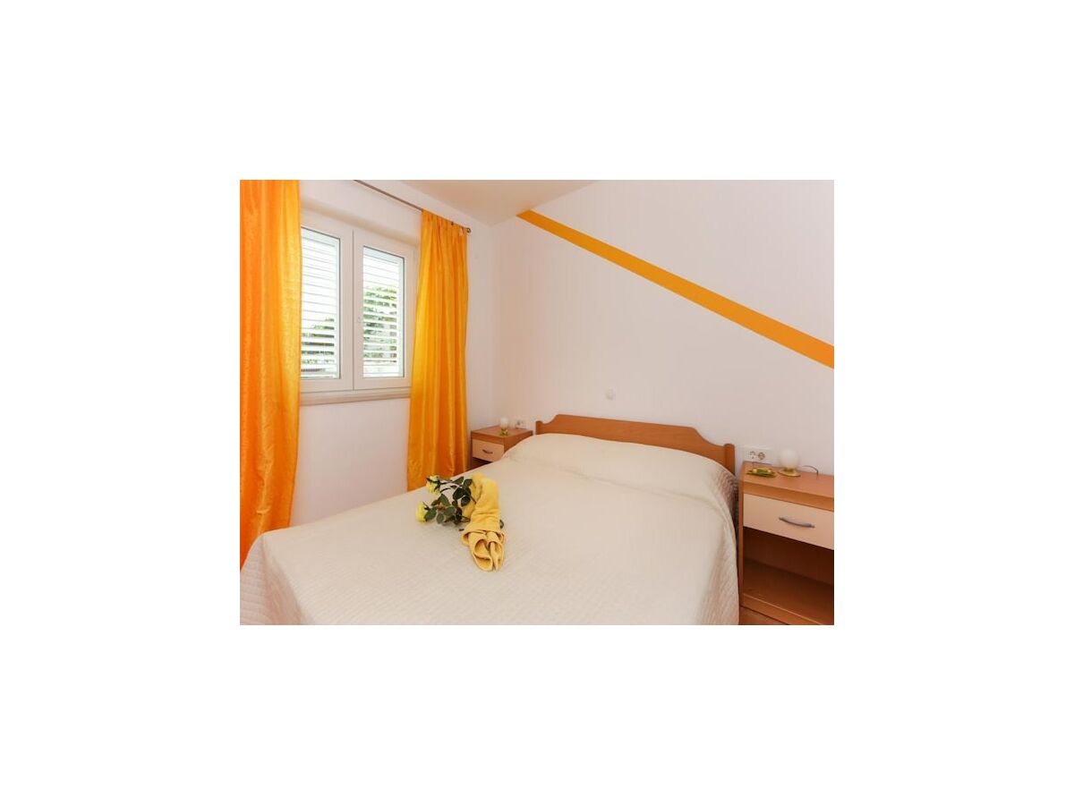 Apartment Apartments Pojko - One-Bedroom Apartment with Terrace (Yellow) - Features photo 5