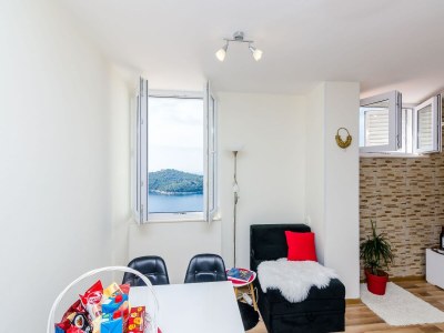 Apartment Apartment Vedrana- One-Bedroom Apartment with Balcony and Sea View - Features photo 14