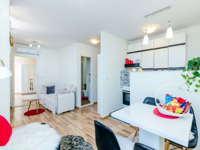 Apartment Apartment Vedrana- One-Bedroom Apartment with Balcony and Sea View - Features photo 15