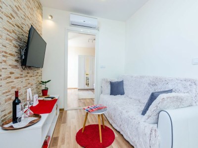 Apartment Apartment Vedrana- One-Bedroom Apartment with Balcony and Sea View - Features photo 17