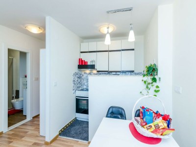Apartment Apartment Vedrana- One-Bedroom Apartment with Balcony and Sea View - Features photo 25