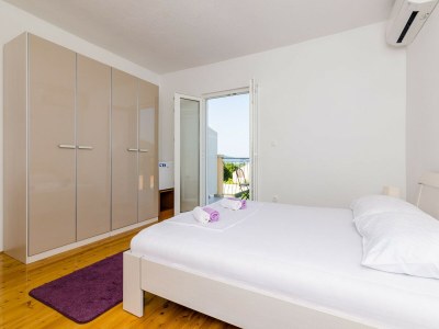 Apartment Apartment & Rooms Maždin - Triple Room with Balcony and Sea View ( Soba More ) - Features photo 15