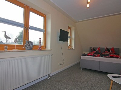 Apartment Einladende Ferienwohnung am Achterwasser in Lütow - Features photo 12