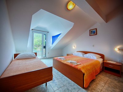 Apartment Apartments Malo Lago - One-Bedroom Apartment with Two Balconies and Sea View - Attic (Apartment 2) - Features photo 6