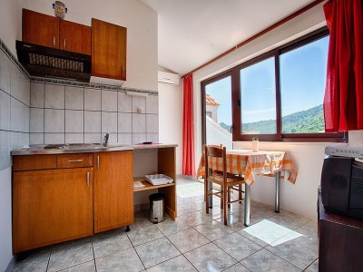 Apartment Apartments Malo Lago - One-Bedroom Apartment with Two Balconies and Sea View - Attic (Apartment 2) - Features photo 7