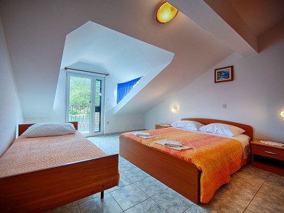 Apartment Apartments Malo Lago - One-Bedroom Apartment with Two Balconies and Sea View - Attic (Apartment 2) - Features photo 10