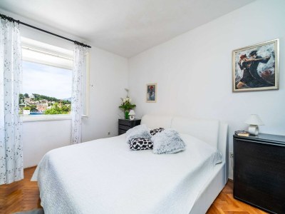 Apartment Apartments & Rooms Mara & Petrunjela - Two Bedroom Apartment with Terrace and Sea View - Features photo 22