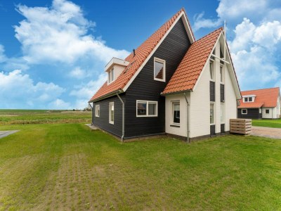 Holiday house Spacious holiday home with sauna in Sint-Maartensdijk - Holiday house