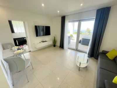 Holiday house Holiday home with bubble bath , sauna and sea view - Features photo 8