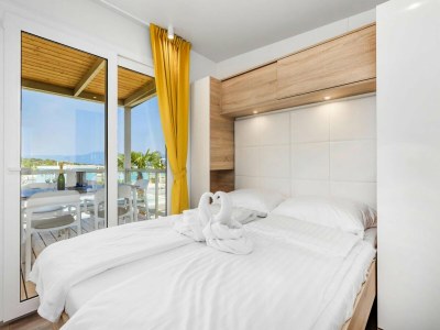 Holiday park Mobile Home Omisalj with Seaview at Beach - Features photo 6