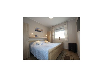 Apartment Ferienwohnung mit Sonnenterrasse in Dornumersiel - Features photo 9