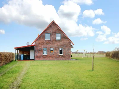 Holiday house Ferienhaus am Deichtor in Neßmersiel - Outdoor photo 3
