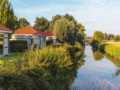 Holiday park Villa in Netherlands with Private Jetty - Environment photo 7