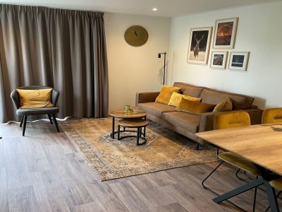 Holiday park Chalet with dishwasher in a park - Features photo 14