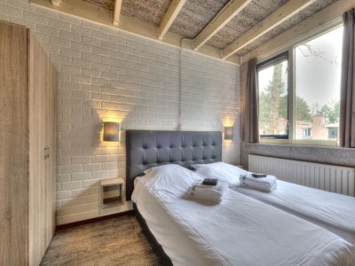 Holiday park Bungalow in Weerterbergen with Garden & Fireplace - Features photo 3