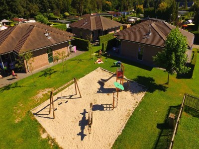Holiday park Bungalow in Netherlands with Garden Terrace - Outdoor photo 37