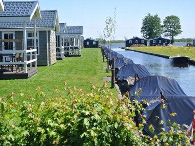 Holiday park Lakeside Cottage with Boat - Outdoor photo 9