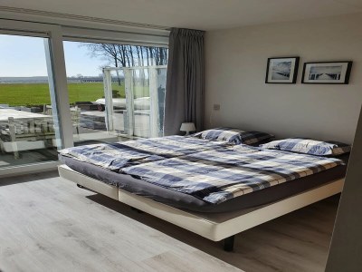 Holiday house Wunderschönes Ferienhaus am Strand in Kamperland - Features photo 13