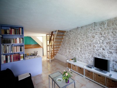 Holiday house Beautiful holiday home on the island Brac, with the sea and a small beach in front of the door! - Features photo 11