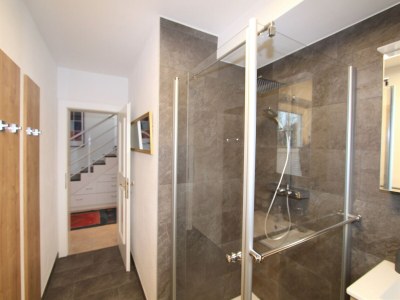 Holiday house Holiday flat in the centre of Söll with pool - Features photo 23
