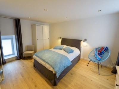 Holiday house Spacious holiday home with heated indoor pool - Features photo 28