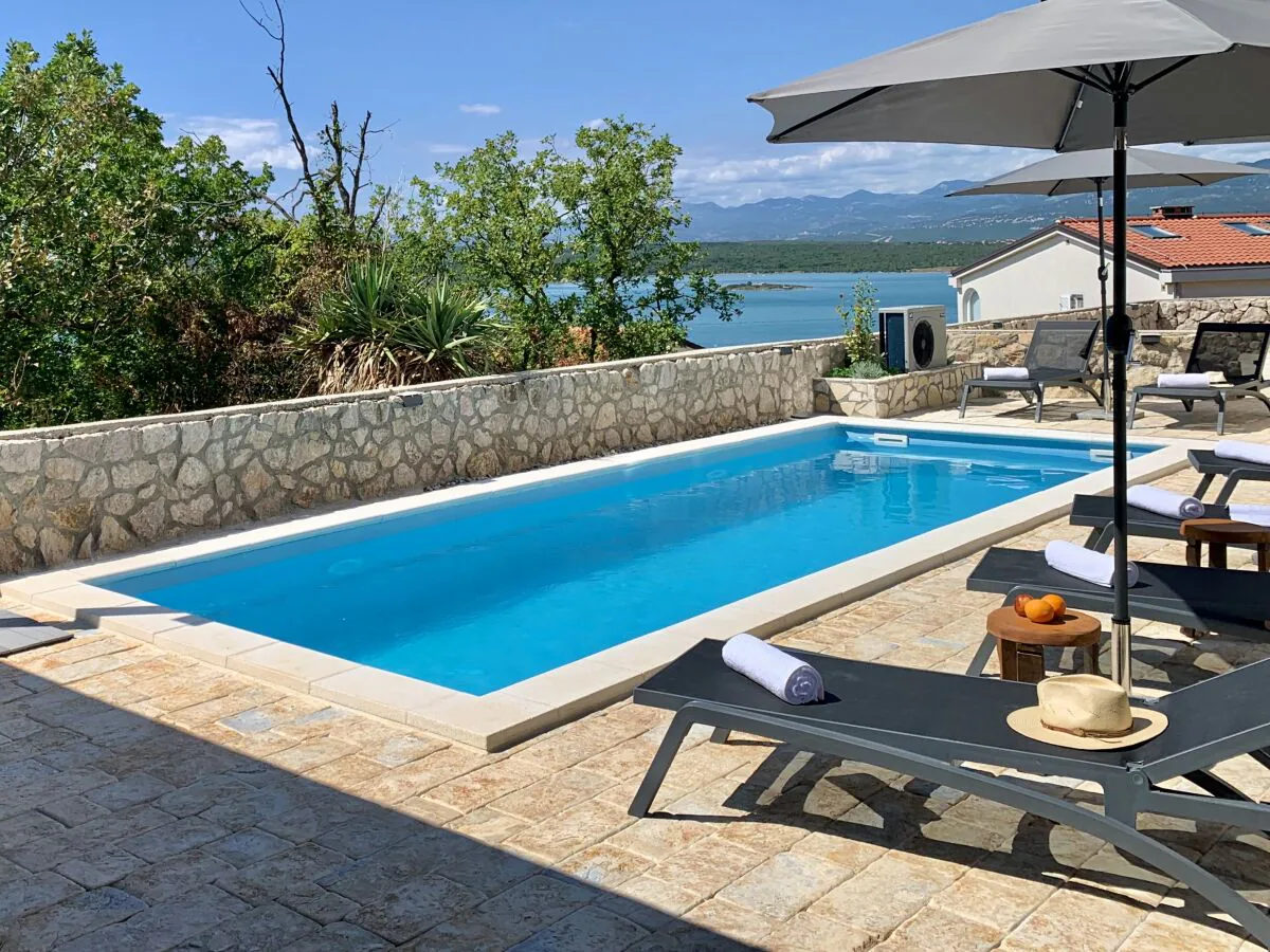 Holiday apartment GIA with heated pool and ocean view