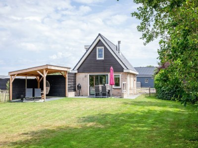 Holiday house Holiday home near dunes with wellness garden - Outdoor photo 8