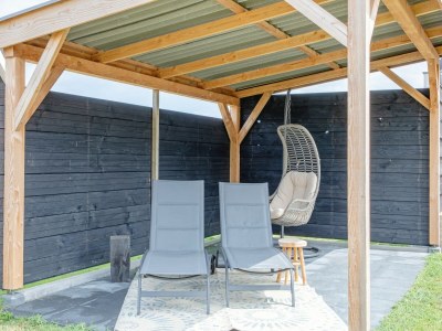 Holiday house Holiday home near dunes with wellness garden - Outdoor photo 9
