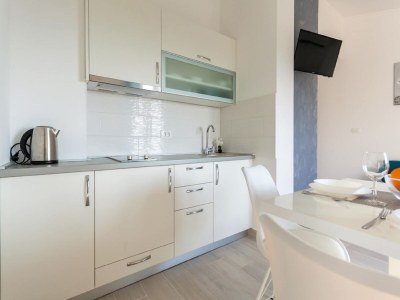 Apartment Apartment in Omišalj with Rooftop Terrace - Features photo 5