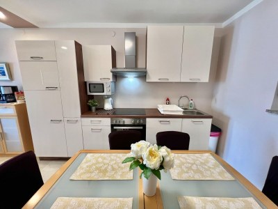 Apartment Apartment in Dramalj near Beach & Pool - Features photo 10