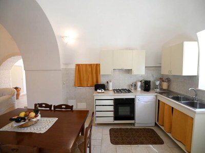 Holiday park Trulli in Valle d'Itra mit Pool und Aussicht - Features photo 34