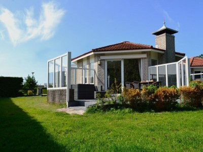 Holiday house Nice house on the golf course with sauna in Ameland - Holiday house