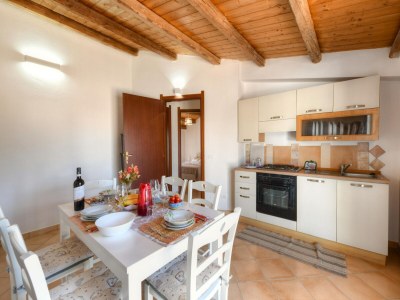 Apartment Schöne Wohnung mit Pool - Features photo 30