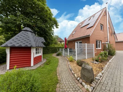 Holiday house Modernes Ferienhaus mit Sauna in Wiek am Meer - Outdoor photo 6