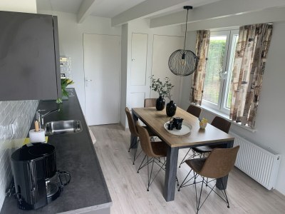 Holiday house Cosy holiday home with large garden - Features photo 9