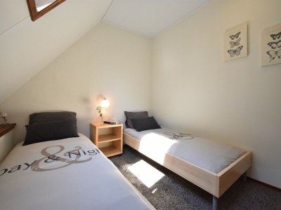 Holiday house Cosy holiday home with large garden - Features photo 17