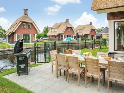 Holiday park Villa in Friesland mit Wassersteg - Outdoor photo 2